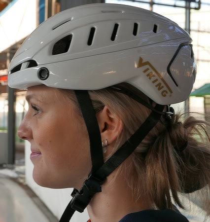 Photo of a female skater wearing a skate helmet