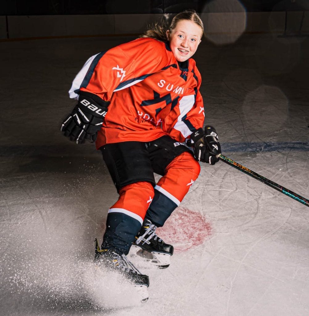 Icehockey player making a powerstop